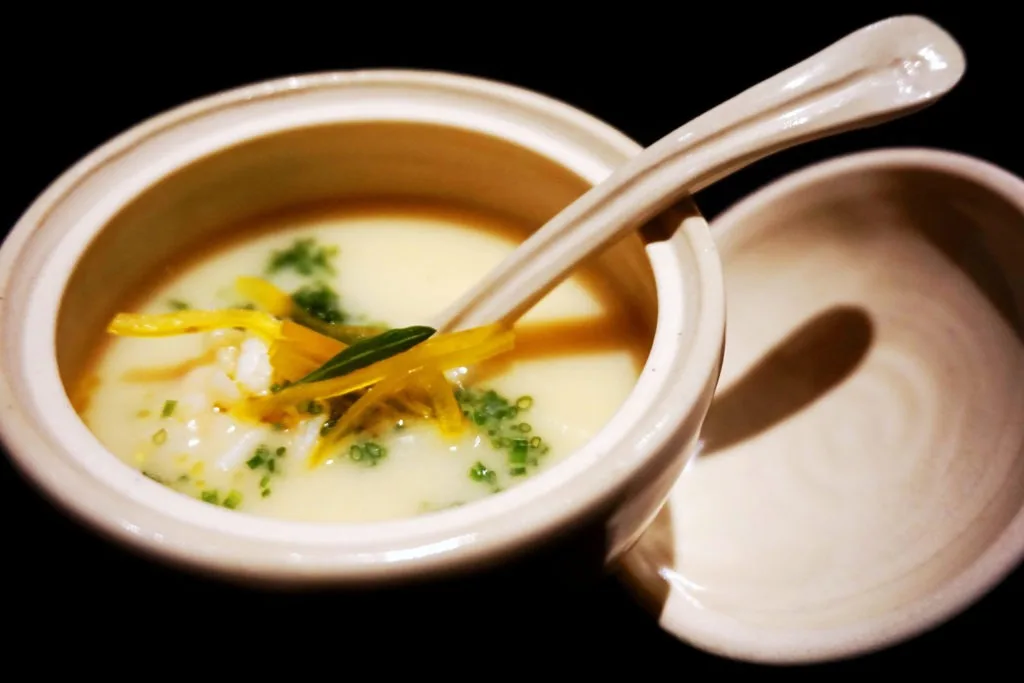 Bowl of creamy corn and king crab soup