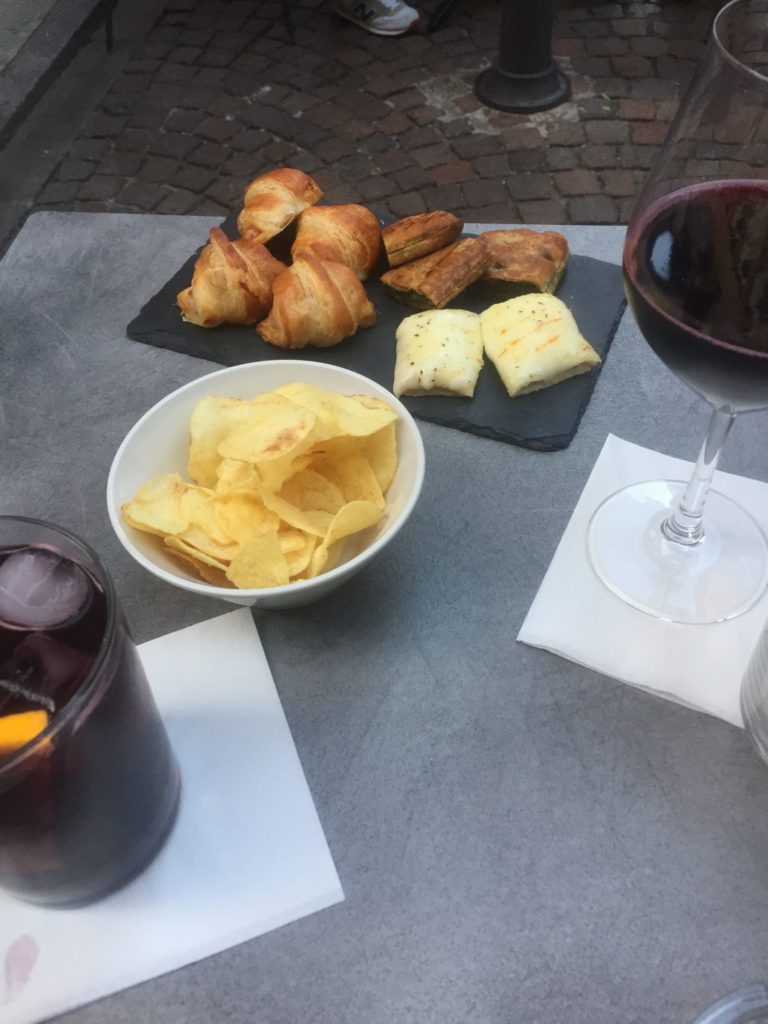 Two drinks with aperitivos