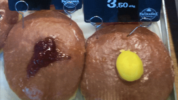 Overhead video of different paczki with a variety of fillings
