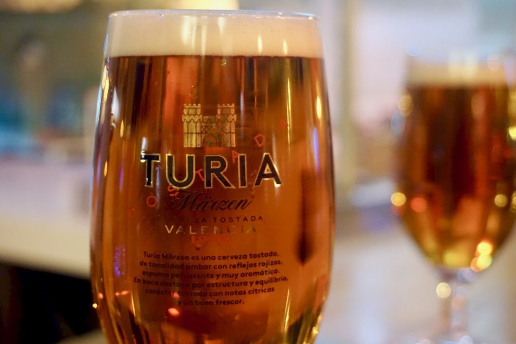 Glass of Turria beer with another in the background