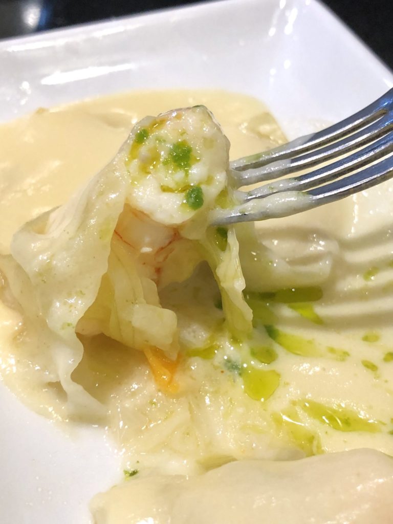 Ravioli filled with langostine and a cream sauce