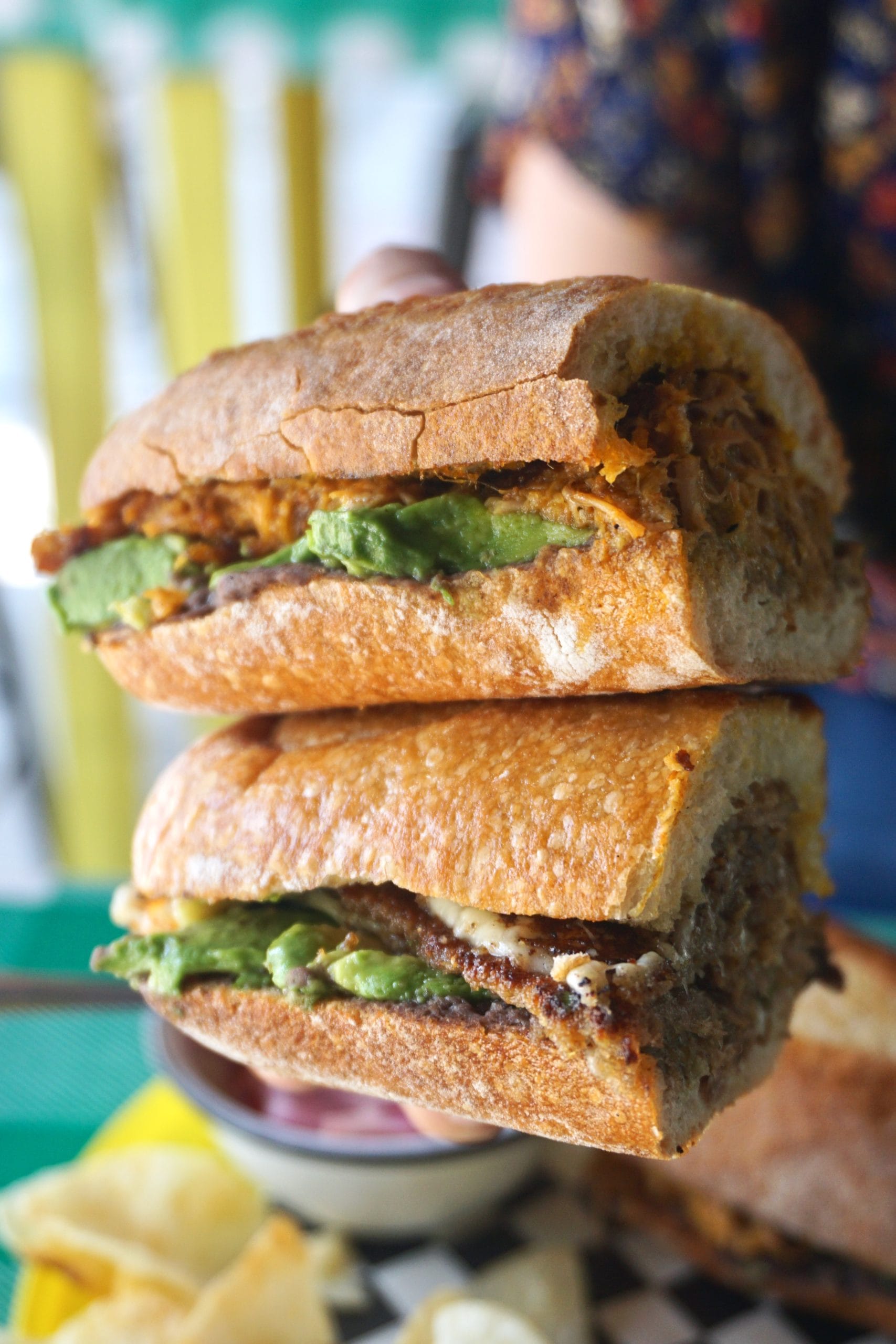 Two halves of a torta stacked on top of each other