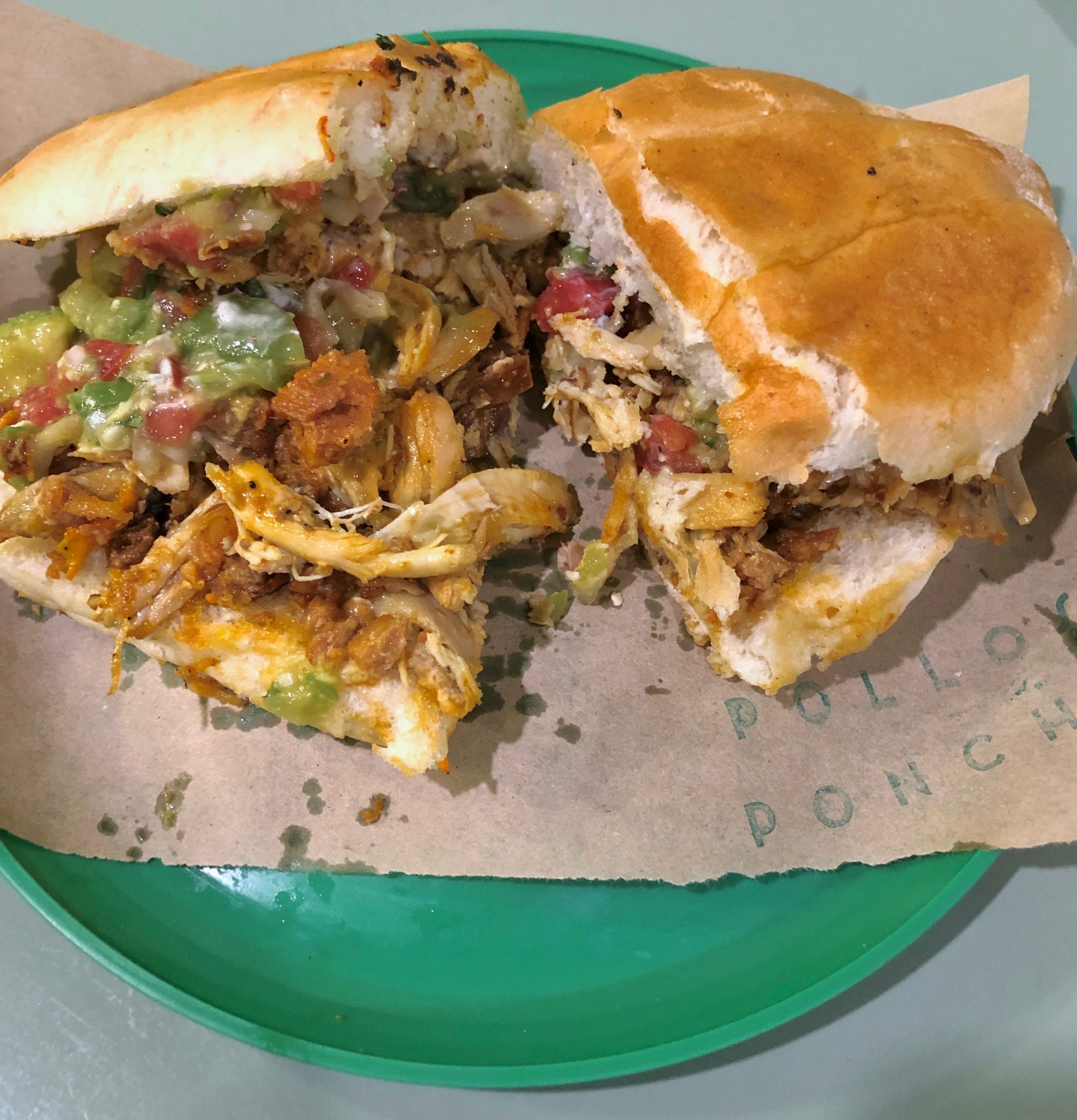 Chicken torta on a green plate