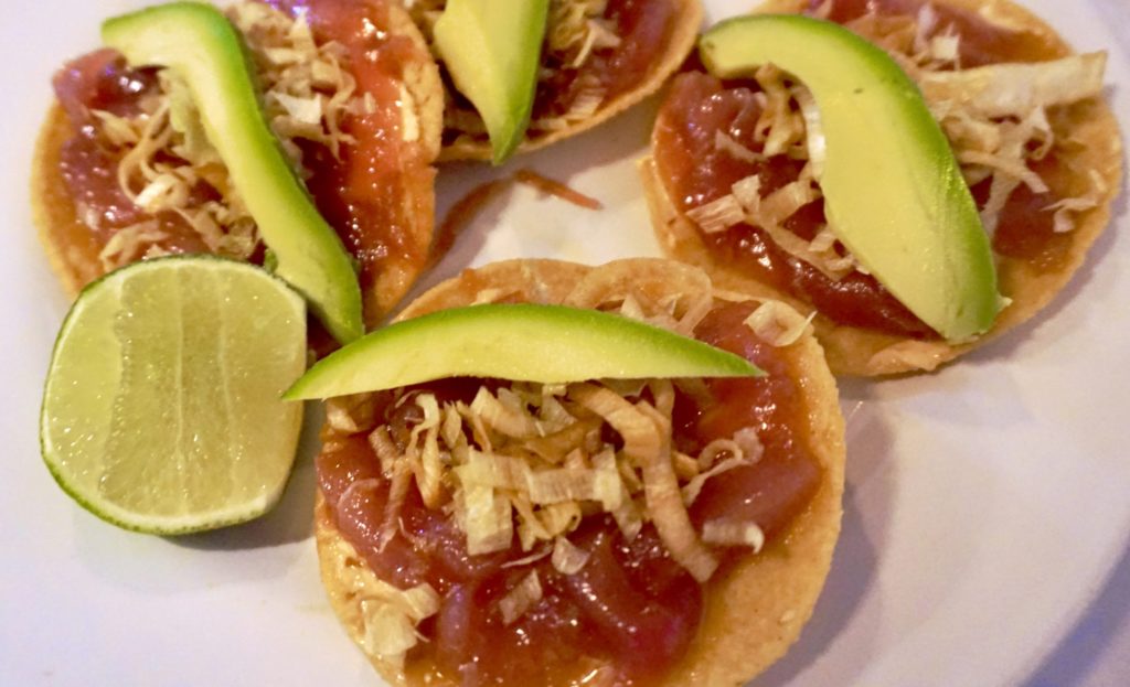 Tuna tostadas topped with avocado and crispy onion from Contramar in Mexico City