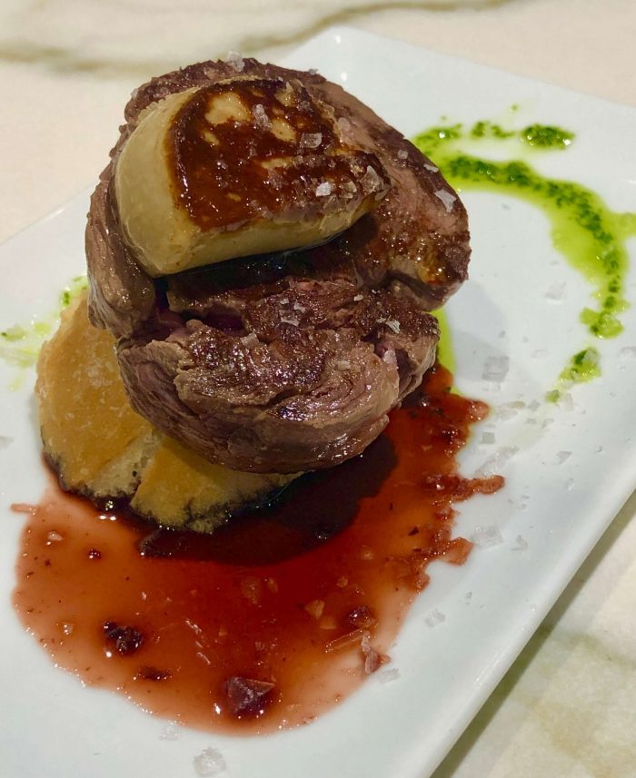 Grilled sirloin and foie gras on top of bread from Taberna Dakara Bi in San Sebastián.